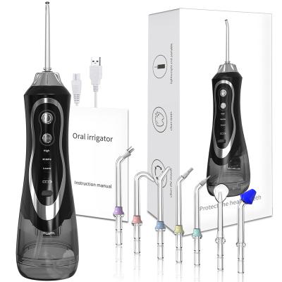 China Outdoor Electric Tooth Device Family Use Travel Cleaning Teeth Care Irrigator Water Tank Oral Attached Rechargeable Water Flosser Rinser for sale