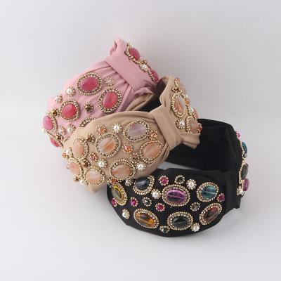 China 2021 European and American bohemian fashion luxury style 4 colors stone colorful rhinestone pearl knot woman fabric headbands/headbands for sale