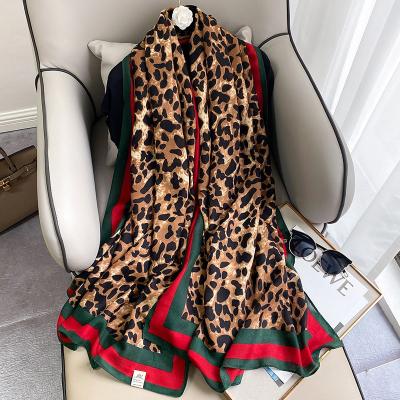 China New Designer Fashion Silk Scarf For Women Soft Mufflers Autumn Winter Fashionable Leopard Print Shawls for sale