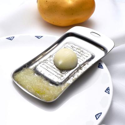 China Viable Hot Selling Dish of Stainless Steel Wasabi Grater Amazon Mini Ginger Garlic Cheese Grinding Tool for sale