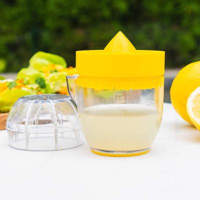 China Viable High Quality Multifunctional Manual Lemon Squeezer Orange Hand Juice Extractor With Clear Measuring Cup for sale