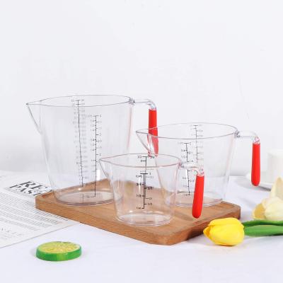 China 3 Sizes Viable Plastic Clear Measuring Cups With Handle And Spout Measuring And Handle Cups For Daily Home Kitchen Use for sale