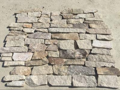 China Sesame Yellow Granite Field Stone Random Stone Veneer Natural Granite Ledgestone for sale