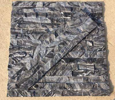 China Black wooden marble culture stone,black forest marble stacked stone,black wood vein marble ledgestone,stone cladding for sale