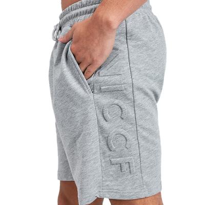 China Anti-Wrinkle Sporty Wear Shorts Men Casual Workout Cotton Running Embossed Shorts for sale