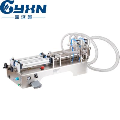 China Quantitative Horizontal Pneumatic Dual Head Semi-automatic Food Liquid Filling Machine for sale