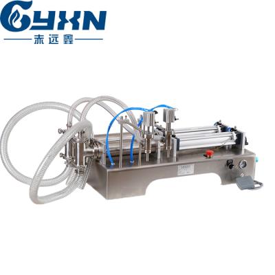 China Beverage Pneumatic Double Head Horizontal Lubricant And Laundry Liquid Dispensing And Filling Machine for sale