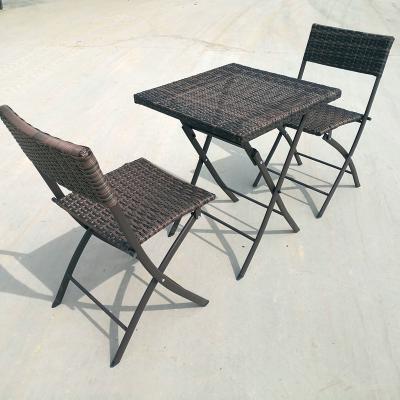 China 3pcs Space Saving Folding Cafe Bistros Set Rattan Mail Pack Folding Wicker Furniture for sale