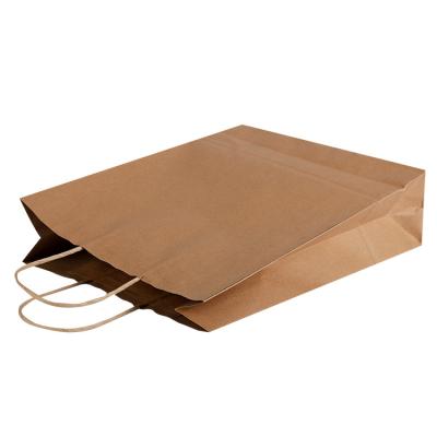 China Package Printing Wholesale Cheap Custom Brown Flat Handle Kraft Paper Bag With Logo Print for sale