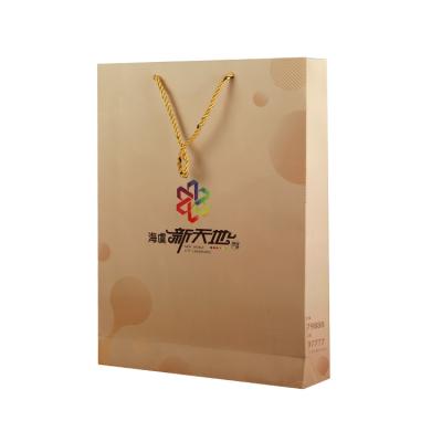 China Recycled Materials Wholesale High Grade Luxurious Custom Logo Paper Bag With Rope Handle for sale