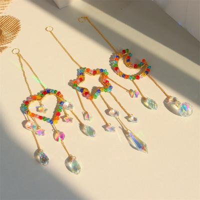 China Art Deco Crystal Wind Chimes Rainbow Moon Sun Catcher k9 Crystal Hanging For Windows Car Prism Wedding Decoration for sale