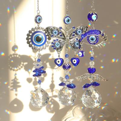 China Art Deco Wholesale k9 Glass Prism Butterfly Evil Eye Rainbow Crystal Sun Catcher Outdoor For Window Garden Hanging Decoration for sale