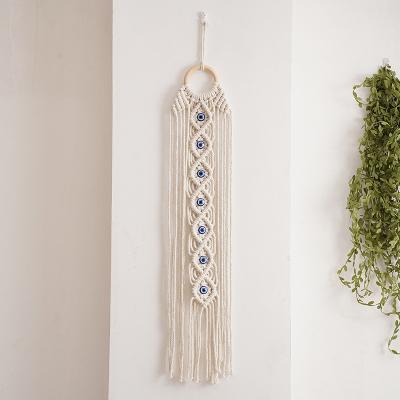 China Art Deco Boho Blue Evil Eye Cotton Macrame Wall Hanging Woven Dream Catcher For Bedroom Apartment Ornament for sale