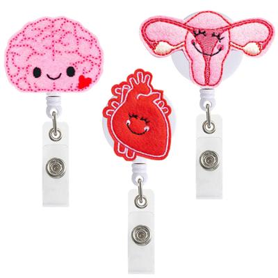 China Acrylic Retractable Badge Reel Holder for Nurse Brain Badge Reel Felt Tag Holder Lung Heart ID Badge Reel Clip for sale