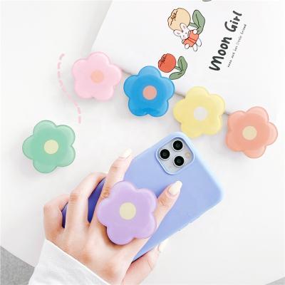 China Adjustable Custom Epoxy Acrylic Mobile Phone Grip Cartoon Logo Flower Phone Grip Holder for sale