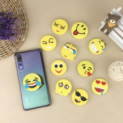 China Collapsiblei Cute PVC+ABS Gifts Portable Soft PVC Phone Holder Plug for sale