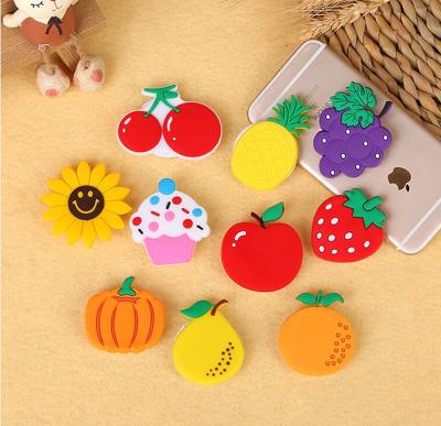 China Custom PVC+ABS 3M Sticker Soft PVC Fruit Airbag Mobile Phone Bracket Holder for sale