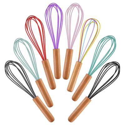 China Viable Wholesale Wooden Hand Handle Reusable Silicone Egg Beats For Kitchen Egg Beater Mixer for sale