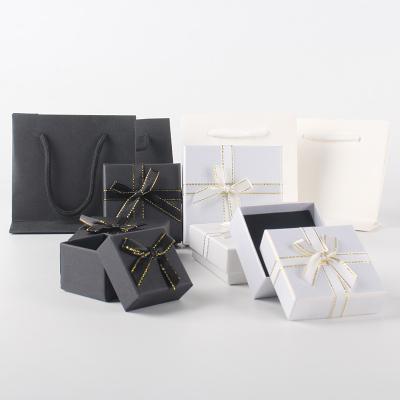 China Paper Box Packaging Gift Box With Ribbon Custom Logo Jewelry Boxes Set Paper Gift Packaging Box Ring Necklace Jewelry Box With Gift Bag for sale