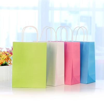 China Handmade Personalized Custom Pink/Green Clothes Kraft Paper Gift Tote Bags for sale