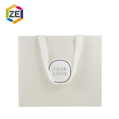 China Low Cost Recyclable Personalized Custom Reusable Paper Bags Christmas Kraft Paper Gift Bag For Jewelry With Logo Print for sale