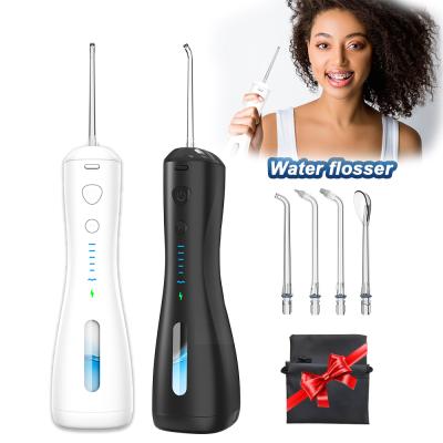 China Hotel IPX7 Rechargeable Waterproof Detachable 240ml Tank Water Pick Teeth Cleaner Dental Oral Irrigator For Bridges Care for sale