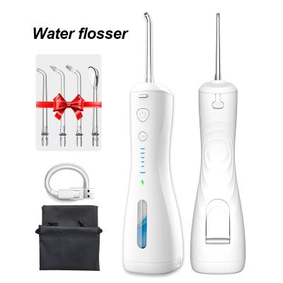 China Hotel 240ML Rechargeable Waterproof IPX7 Water Dental Flosser USB Portable Oral Irrigator With Tips Case For Travel for sale