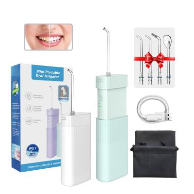 China Hotel New Arrival Professional Electric Dental Water Dental Custom Logo Oral Irrigator With Multiple Nozzles And 3 Modes for sale