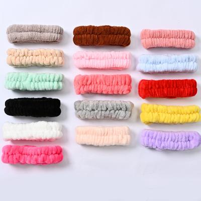 China Custom Non-slip Logo Spa Headband Outdoor Sport Embroidery Hair Bands For Washing Shower Coral Fleece Women Face Fluffy Bow for sale