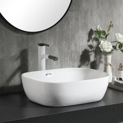 China Pinzhu Modern Handmade Ceramic Rectangular Wash Basin White Above Counter Basin Bathroom Wash Sink For Hotel for sale