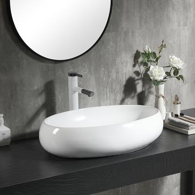 China Modern Ceramic Handmade Glossy White Bathroom Sink Vanity Basins Countertops Ceramic Basin Sink Pinzhu for sale