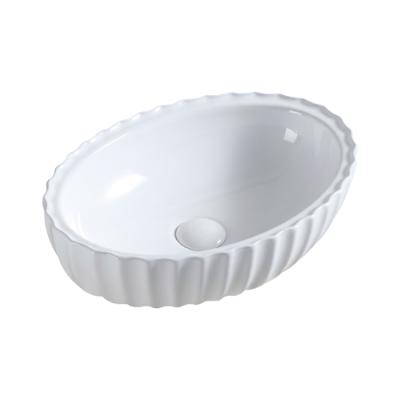 China Wholesale Modern Style Modern Wave Outside Ceramic Bathroom Oval Wave Above Countertop Art Basin Wash Hand Sink For Home for sale