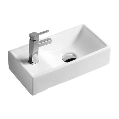 China Low price eco-friendly hot sale modern soild exterior rectangle wall hung basin wash sinks art ceramic basins for sale