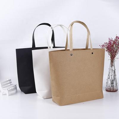 China Recycled Materials Hot Sale Kraft Paper Gift Bags With Handles Brown Party Shopping Candy CUB Business Retail Bag for sale