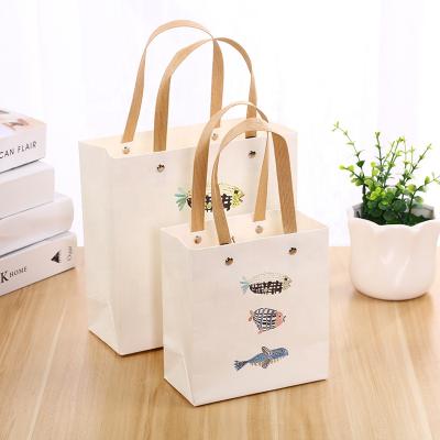 China Recycled Materials Hot Sale Kraft Paper Printing Commercial Luxury Shopping Paper Gift Bag for sale