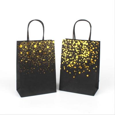 China Recycled Materials Wholesale Paper Bags With Handles For Shopping Gift Merchandise Gift Retail Bags for sale