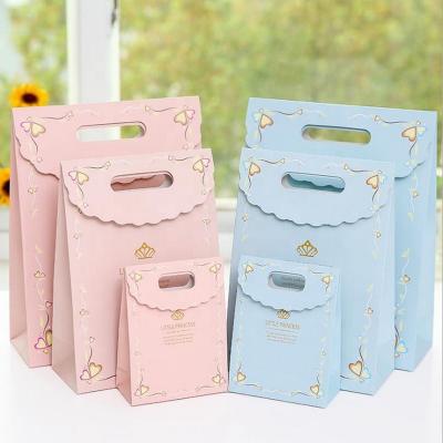 China Hot Sale Recycled Materials Kraft Paper Printing Shopping Paper Bags Luxury Creative Creative Gift Handbags Gift Packaging Bags for sale