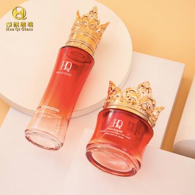 China Glass Bottles New Design Luxury Glass Bottles Crown Lid Skin Care Face Cream Glass Bottle Cosmetic Packaging Jars for sale