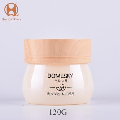 China Luxury Cosmetic Packaging Glass Bottles 120g Glass Jar With Lid Bottle for sale