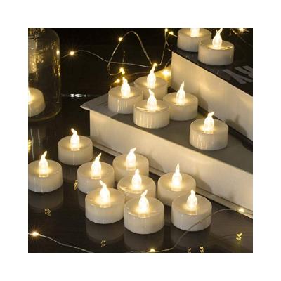 China COLOR CHANGING pack 24pcs led tea light candle light wedding use battery control romantic flameless color changing electric led tealight candles for sale