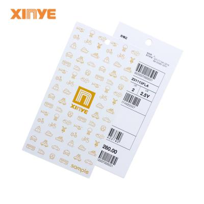 China Anti -counterfeit Xinye RFID tags factory uhf Monza r6 UID EPC rewritable 96bits rfid apparel label garments rfid hang tag for clothing for sale