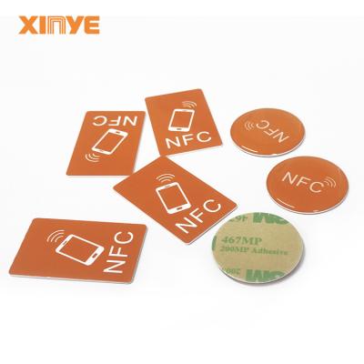 China Waterproof / Weatherproof Programmable rfid nfc card and tags ragular round circle epoxy anti metal nfc sticker tags custom for sale