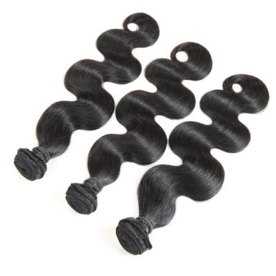 China Remy Human Hair 100% Virgin Hair 3 Bundles With 4*4 Closure Sheer Body Wave 12A Grade Brazilian Remy Hair 2 Inches Longer for sale