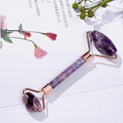 China Skin Tightening Private Label Rose Quartz Jade Facial Roller For Anti Aging Pink Face for sale