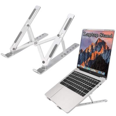 China 7 To 15 Inch Laptop Stand Aluminum Alloy Height Cooling Bracket Creative Foldable Laptop Compatible Multi Height Adjustable for sale