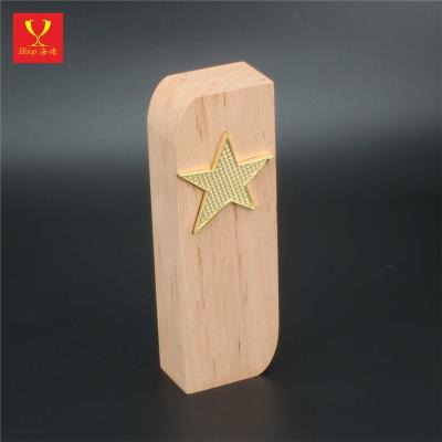 China Africa white raw wood trophy with gold metal star for sale