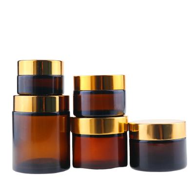 China Cosmetic-bottle OEM Round Thick Wall Amber Glass Cosmetic Jar Storage Jar Candle Glass Jar for sale