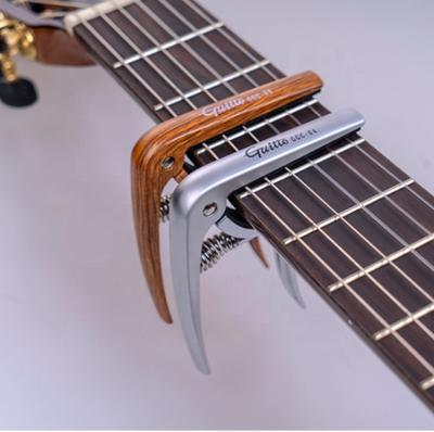 China GGC-04 zinc alloy classic guitar capo is good value for money, with stable performance. for sale