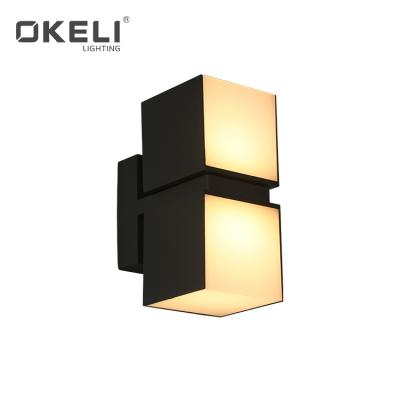 China Easy to installation OKELI 2021 new design small waterproof aluminum ip54 20w led outdoor wall light for sale