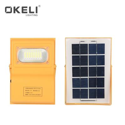 China OKELI outdoor hot sales rechargeable portable solar ultra thin 30w ip65 flood led flood light for sale